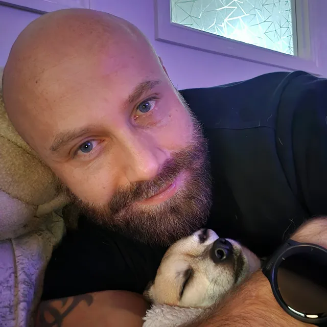 Alex Lawrence with his Chihuahua, Peanut